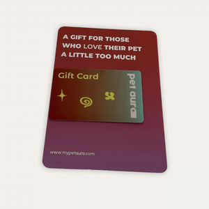 A pet-themed gift card set featuring a larger reddish-brown card with white text that reads 'A GIFT FOR THOSE WHO LOVE THEIR PET A LITTLE TOO MUCH' and a smaller overlapping card in green and gold with 'Pet aura' branding.