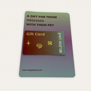 A pet-themed gift card set on a light background. The outer card is iridescent with a green-to-purple gradient and reads 'A GIFT FOR THOSE OBSESSED WITH THEIR PET'