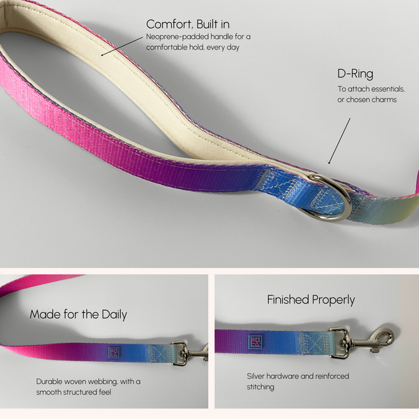 An iridescent gradient pet leash with a pink, purple, and blue color-shifting finish, shown with callout labels pointing to the padded cream handle, D-ring, and woven webbing. Three bottom panels show close-ups of the strap's texture, silver hardware, and stitching with text overlays: 'Made for the Daily', 'Finished Properly', and a feature description.