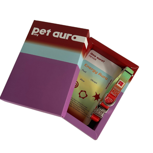 A pet collar presented inside an open branded box. The collar is rainbow coloured.